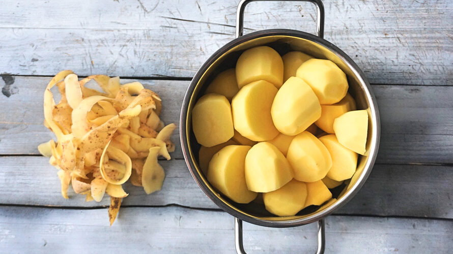 Potatoes in a pot. raw, peeling potatoes. cooking boiled potatoes.